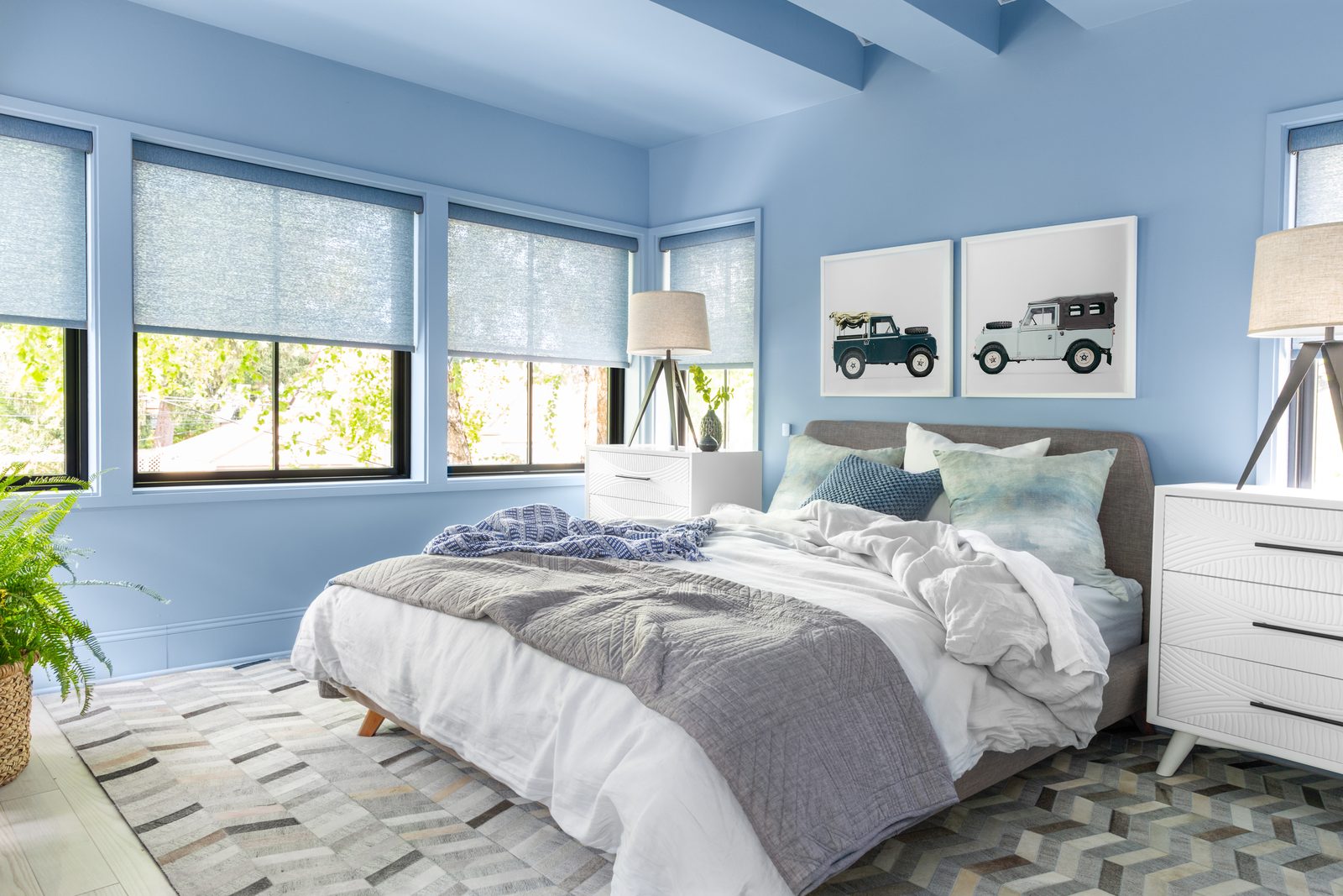 Editorial wide-angle interior photograph of a master bedroom, the kind of current-portfolio image a rolling refresh keeps near the top of the rotation.