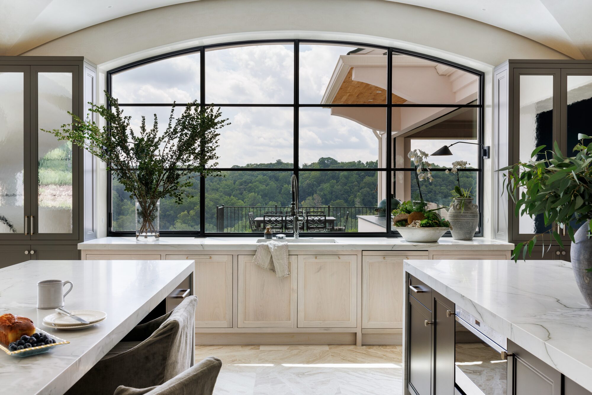 Atlanta kitchen with arched window and custom cabinetry