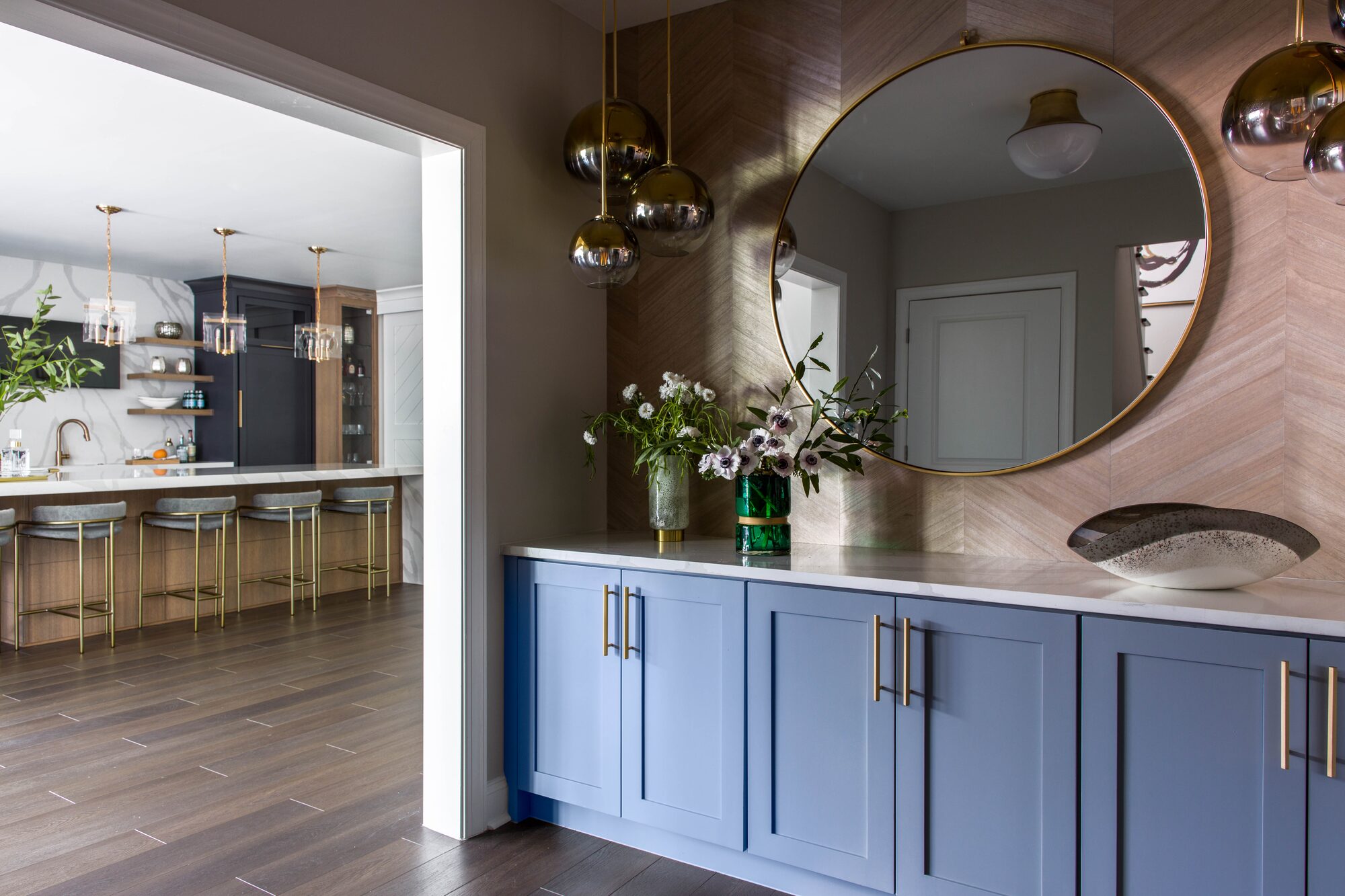 Residential living space with kitchen connection and custom cabinetry